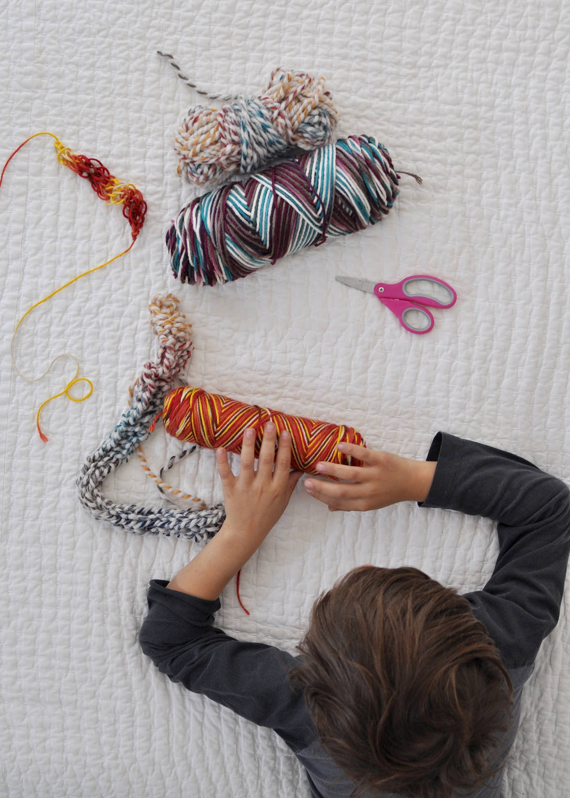 Montessori-Inspired: Finger-Knitting with Oliver